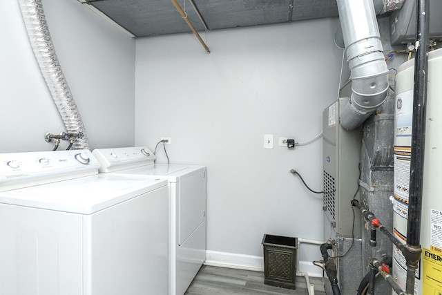 1557 Scottdale Cir, Wheaton, IL 60189 - laundry room with washer and clothes dryer, wood finished floors, and water heater