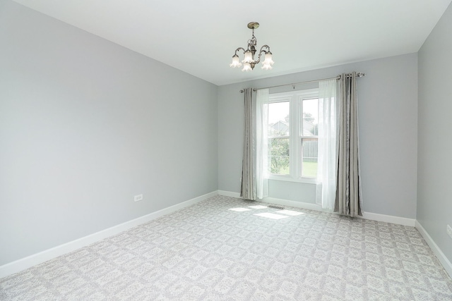 1557 Scottdale Cir, Wheaton, IL 60189 - empty room featuring a chandelier and light colored carpet