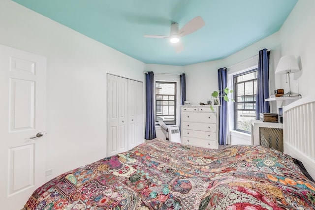 7021 N Sheridan Rd Unit 1, Chicago, IL 60626 - bedroom featuring multiple windows, a closet, and a ceiling fan
