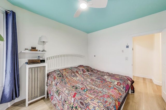 7021 N Sheridan Rd Unit 1, Chicago, IL 60626 - bedroom featuring wood finished floors and ceiling fan