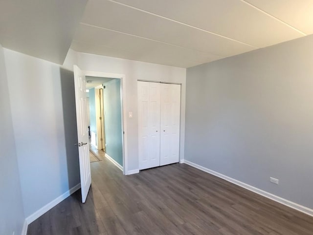 11009 Stony Creek Dr Unit 1C, Palos Hills, IL 60465 - unfurnished bedroom with dark wood finished floors and a closet