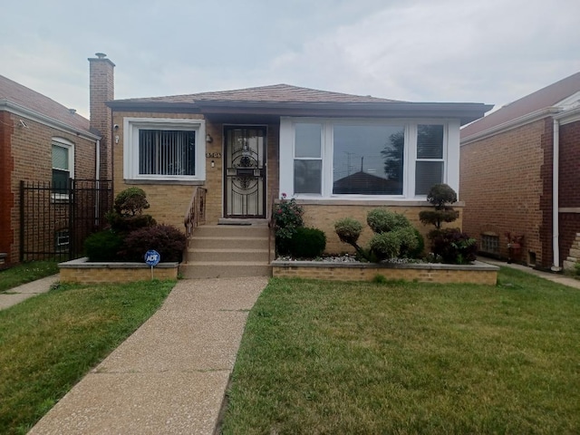 8506 S Jeffery Blvd, Chicago, IL 60617 - view of front of house with a shingled roof