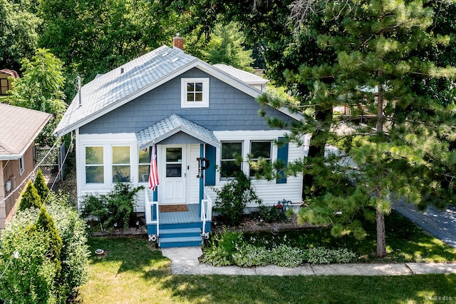 15429 Lamon Ave, Oak Forest, IL 60452 - bungalow-style house with a chimney and a front lawn
