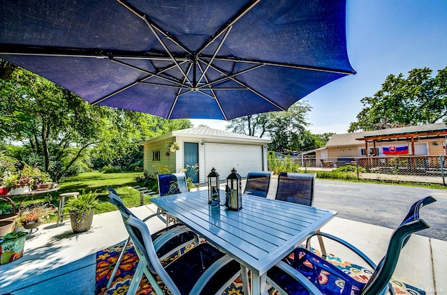 15429 Lamon Ave, Oak Forest, IL 60452 - view of patio / terrace with outdoor dining area, an outdoor structure, and driveway