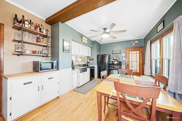 15429 Lamon Ave, Oak Forest, IL 60452 - dining room with light wood-type flooring, a ceiling fan, and crown molding
