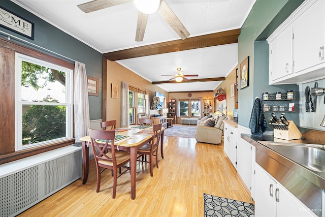 15429 Lamon Ave, Oak Forest, IL 60452 - dining area with radiator heating unit, ceiling fan, light wood-style floors, and ornamental molding