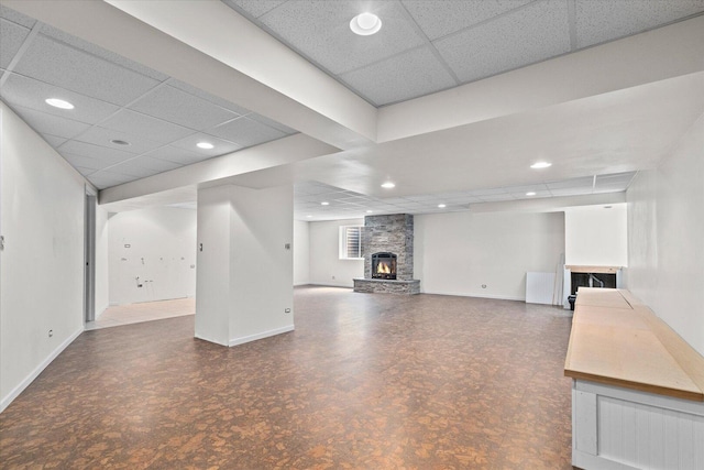 270 Birch Ln, Saint Charles, IL 60175 - basement with a paneled ceiling, a stone fireplace, and recessed lighting