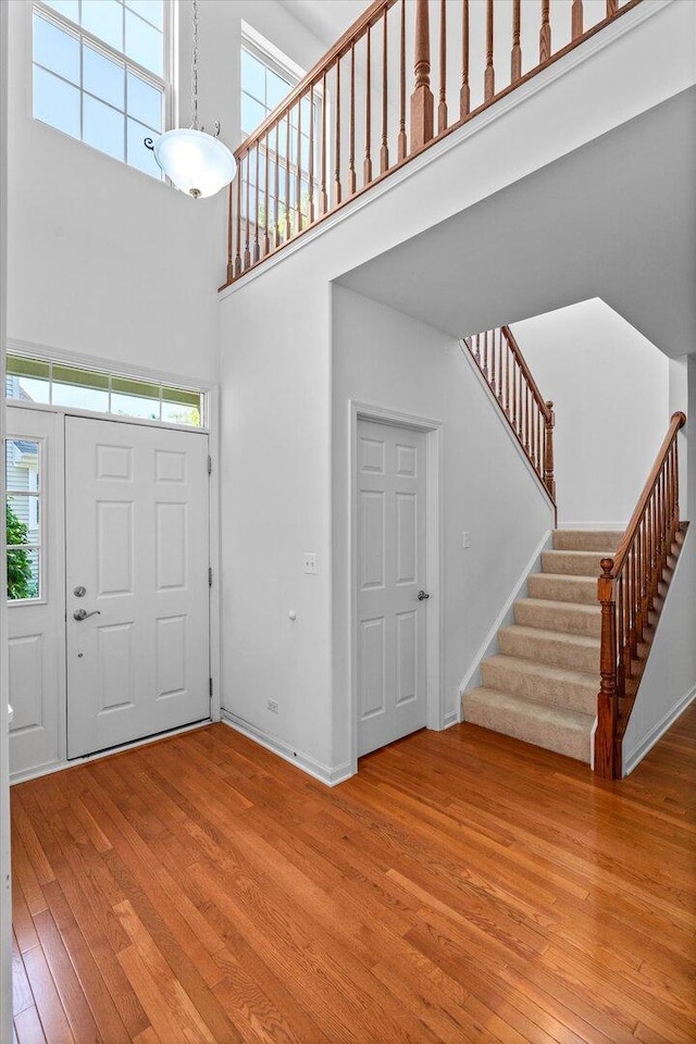 270 Birch Ln, Saint Charles, IL 60175 - foyer entrance with a high ceiling, hardwood / wood-style flooring, and stairway
