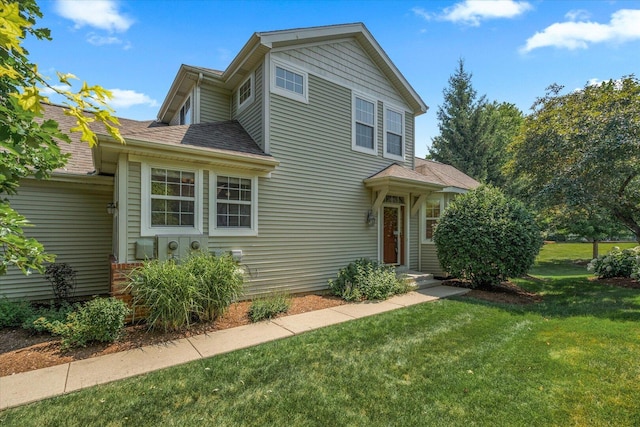 270 Birch Ln, Saint Charles, IL 60175 - traditional-style house featuring a front lawn and a shingled roof