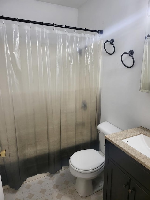 32 Montego Colony Unit 7, Fox Lake, IL 60020 - full bath with vanity, a shower with shower curtain, and tile patterned floors