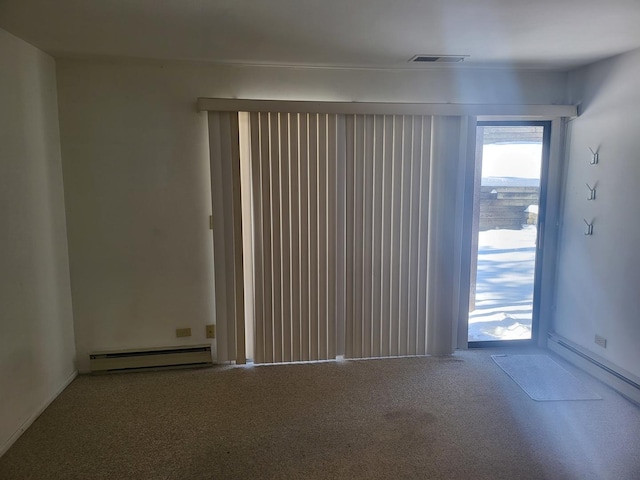 32 Montego Colony Unit 7, Fox Lake, IL 60020 - carpeted spare room with a baseboard radiator