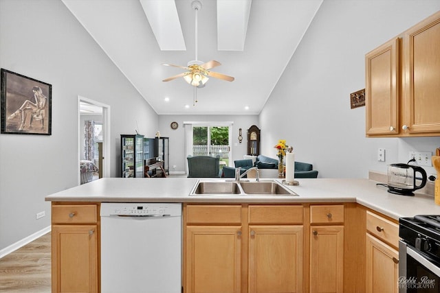 620 S Annandale Dr, Lake In The Hills, IL 60156 - kitchen featuring white dishwasher, a peninsula, lofted ceiling, open floor plan, and light wood-style floors