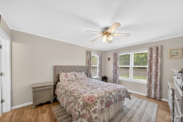 620 S Annandale Dr, Lake In The Hills, IL 60156 - bedroom with light wood finished floors, crown molding, and ceiling fan