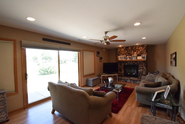 963 E Castlewood Ln, Bartlett, IL 60103 - living area featuring light wood-type flooring, ceiling fan, recessed lighting, and a fireplace