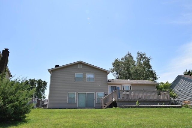 963 E Castlewood Ln, Bartlett, IL 60103 - rear view of property featuring a lawn and a wooden deck