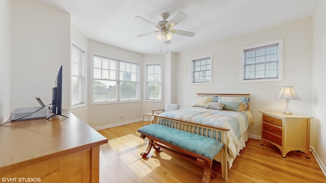 4606 S Woodlawn Ave, Chicago, IL 60653 - bedroom with light wood finished floors and a ceiling fan