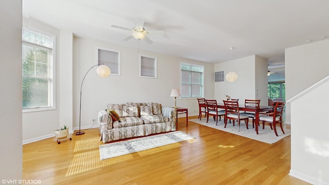 4606 S Woodlawn Ave, Chicago, IL 60653 - living room with a ceiling fan and light wood-type flooring