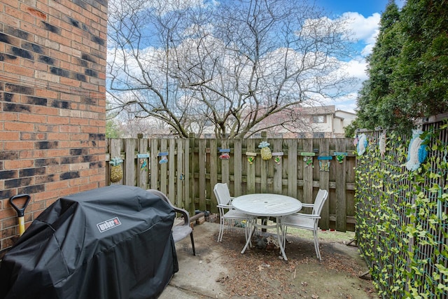 7315 Winthrop Way Unit 6, Downers Grove, IL 60516 - fenced backyard featuring a grill and a patio area