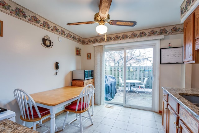 7315 Winthrop Way Unit 6, Downers Grove, IL 60516 - dining area featuring ceiling fan and light tile patterned flooring