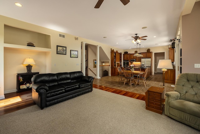 660 Birch Hollow Dr, Antioch, IL 60002 - living room featuring a ceiling fan, dark wood-type flooring, recessed lighting, and stairway