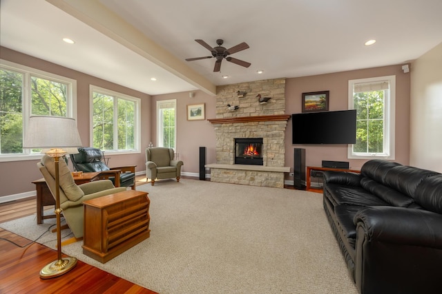 660 Birch Hollow Dr, Antioch, IL 60002 - living area with plenty of natural light, a stone fireplace, ceiling fan, recessed lighting, and wood finished floors