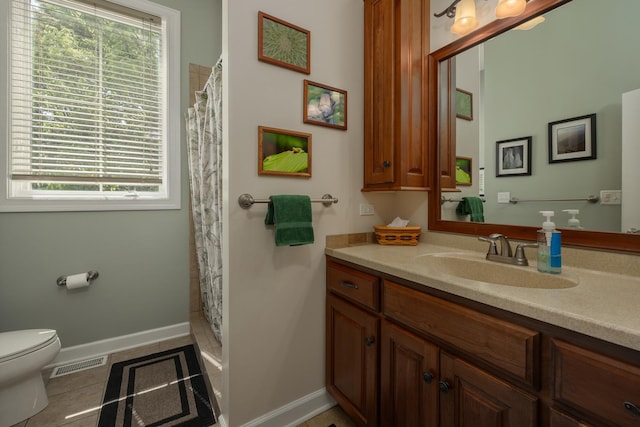 660 Birch Hollow Dr, Antioch, IL 60002 - full bathroom featuring plenty of natural light, vanity, curtained shower, and tile patterned floors