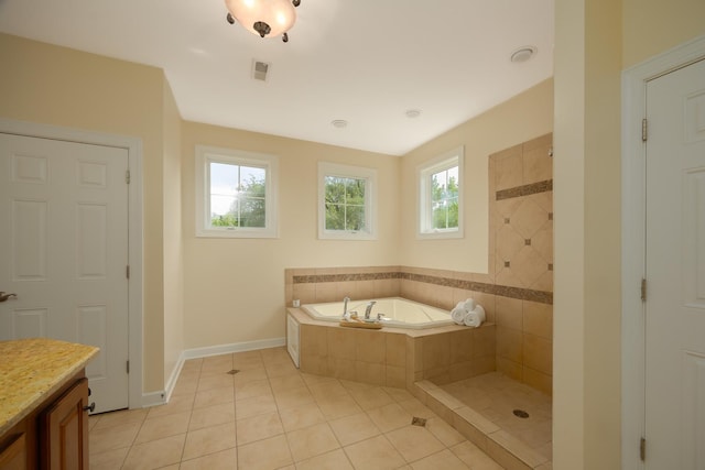 660 Birch Hollow Dr, Antioch, IL 60002 - full bath featuring a bath, healthy amount of natural light, vanity, and tile patterned flooring