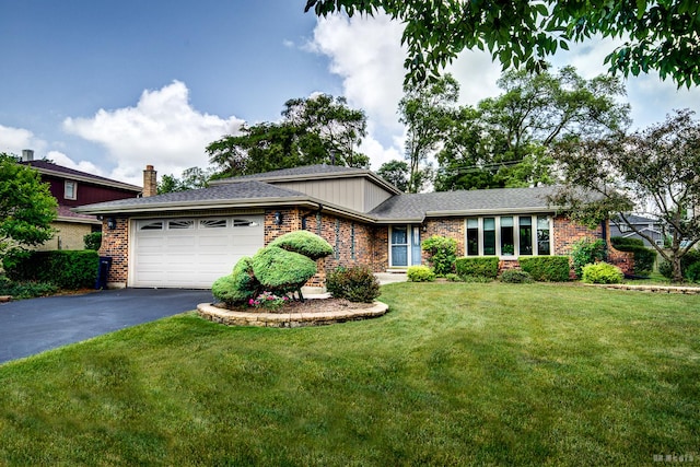 13520 Idlewild Dr, Orland Park, IL 60462 - view of front of property with asphalt driveway, a garage, brick siding, and a front yard
