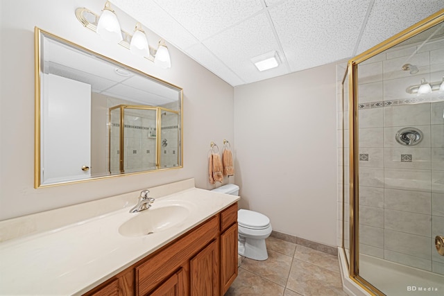 13520 Idlewild Dr, Orland Park, IL 60462 - bathroom with vanity, a stall shower, tile patterned flooring, and a drop ceiling