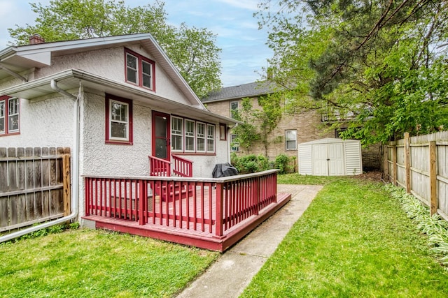 7530 Brown Ave, Forest Park, IL 60130 - rear view of property with a fenced backyard, stucco siding, a shed, and a deck