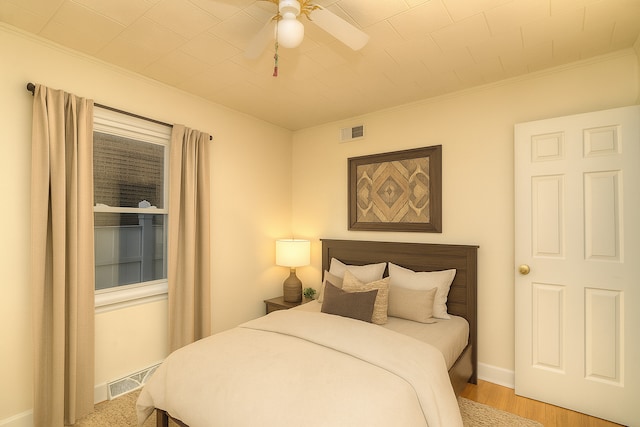 215 W Kimbell Ave, Elmhurst, IL 60126 - bedroom with crown molding, wood finished floors, and ceiling fan