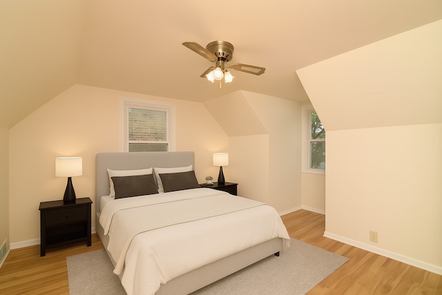 215 W Kimbell Ave, Elmhurst, IL 60126 - bedroom with light wood finished floors, a ceiling fan, and vaulted ceiling
