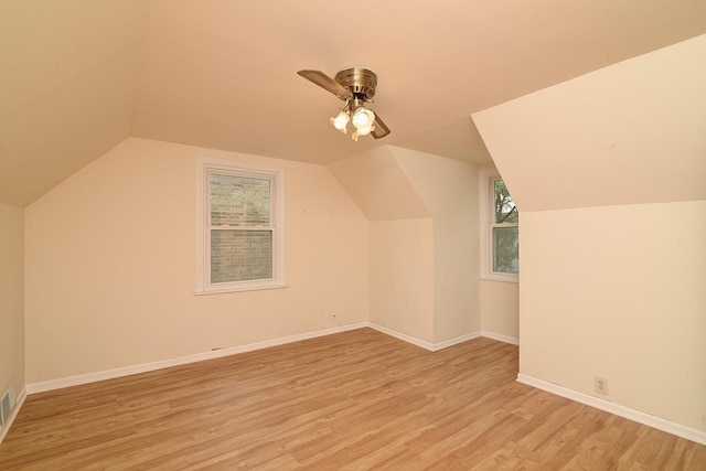 215 W Kimbell Ave, Elmhurst, IL 60126 - additional living space with light wood-type flooring, a ceiling fan, and lofted ceiling