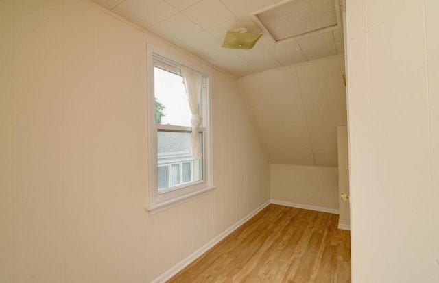 215 W Kimbell Ave, Elmhurst, IL 60126 - additional living space featuring light wood finished floors and vaulted ceiling