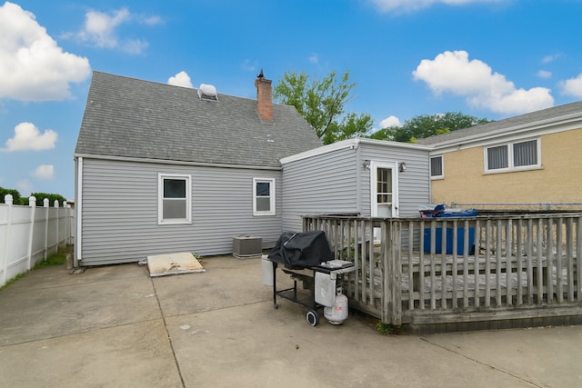 215 W Kimbell Ave, Elmhurst, IL 60126 - back of house with a wooden deck, a chimney, a shingled roof, and a patio area