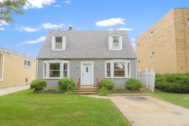 215 W Kimbell Ave, Elmhurst, IL 60126 - cape cod-style house featuring a front lawn, a shingled roof, and a chimney