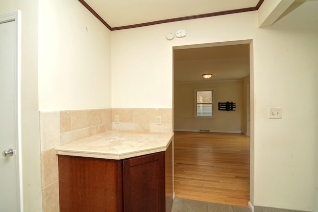 215 W Kimbell Ave, Elmhurst, IL 60126 - bathroom featuring crown molding and wood finished floors