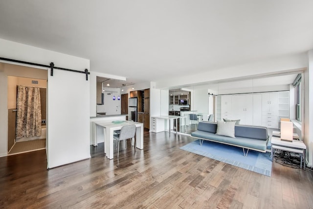 3600 N Lake Shore Dr Unit 2204, Chicago, IL 60613 - living room featuring wood finished floors and a barn door