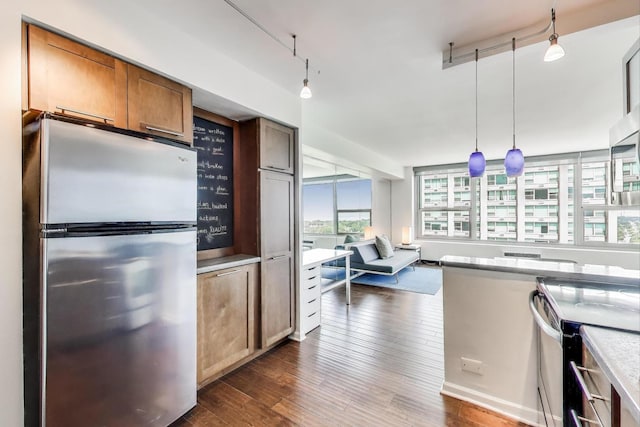 3600 N Lake Shore Dr Unit 2204, Chicago, IL 60613 - kitchen with freestanding refrigerator, electric range, dark wood-style floors, decorative light fixtures, and brown cabinets