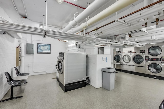 3600 N Lake Shore Dr Unit 2204, Chicago, IL 60613 - shared laundry with washing machine and clothes dryer, stacked washer and clothes dryer, electric panel, and concrete block wall