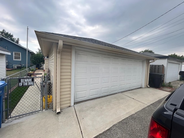 5542 W Grace St, Chicago, IL 60641 - detached garage featuring a gate