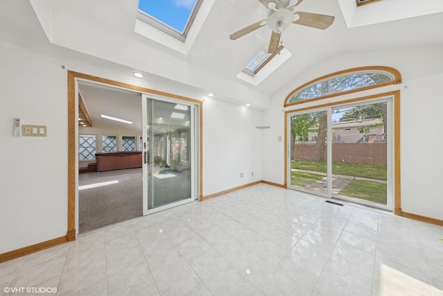 9061 Primrose Ln, Hickory Hills, IL 60457 - empty room with a skylight, lofted ceiling, and a ceiling fan