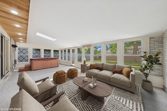 9061 Primrose Ln, Hickory Hills, IL 60457 - sunroom featuring a jacuzzi, vaulted ceiling, a skylight, and recessed lighting
