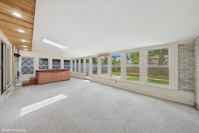 9061 Primrose Ln, Hickory Hills, IL 60457 - unfurnished sunroom featuring a hot tub, lofted ceiling, carpet, a skylight, and recessed lighting