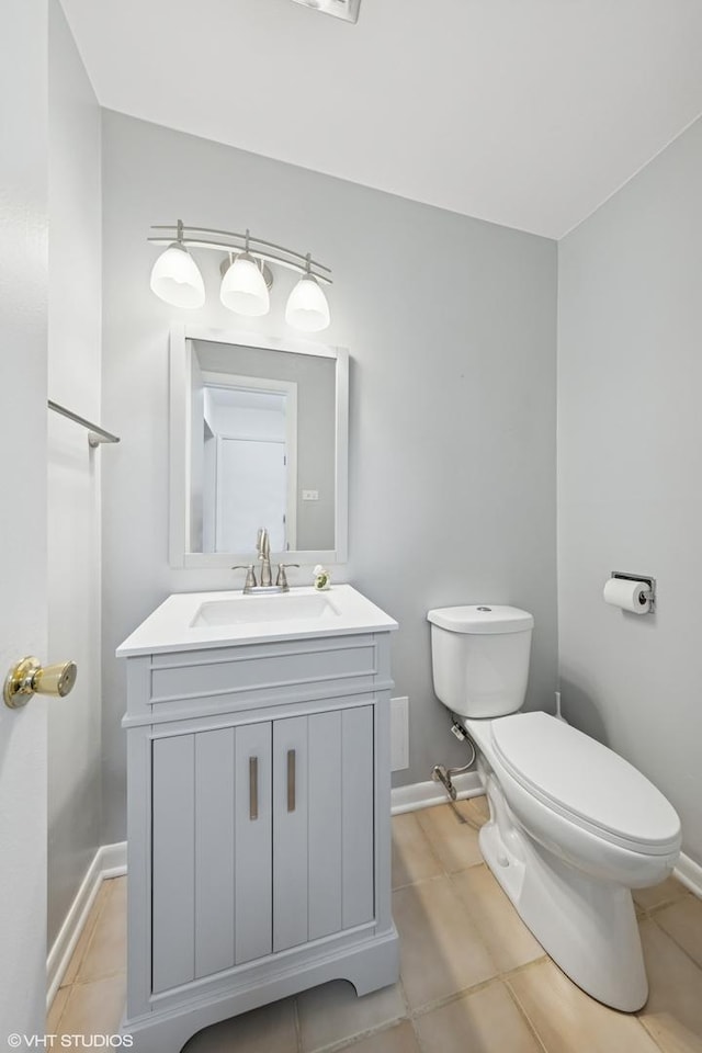 9061 Primrose Ln, Hickory Hills, IL 60457 - half bathroom with vanity and tile patterned floors