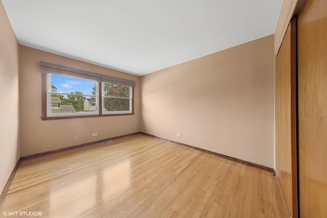 9061 Primrose Ln, Hickory Hills, IL 60457 - empty room with light wood-type flooring and baseboards