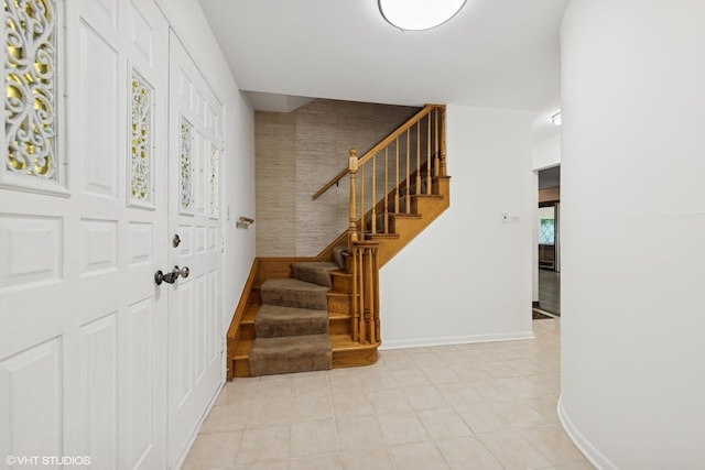 9061 Primrose Ln, Hickory Hills, IL 60457 - entryway featuring stairs and light tile patterned floors