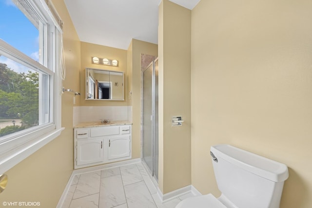 9061 Primrose Ln, Hickory Hills, IL 60457 - full bathroom featuring vanity, marble look tiles, and a stall shower