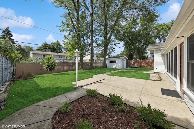 9061 Primrose Ln, Hickory Hills, IL 60457 - fenced backyard with a patio and an outdoor structure