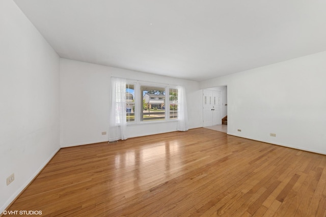 9061 Primrose Ln, Hickory Hills, IL 60457 - empty room with wood finished floors and baseboards